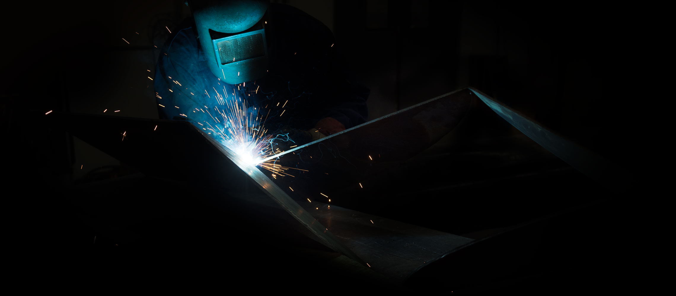 Welder constructing Koflo Blade™ style static mixing elements